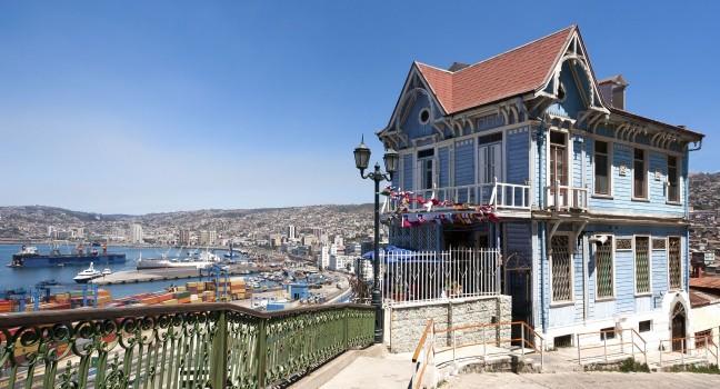 Colorful house in Valparaiso, Chile with view on the port. UNESCO World Heritage.;
