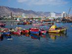 ANTOFAGASTA, CHILE - JUNE 21, 2014: Colourful wooden fishing boats in the harbour at Antofagasta in the Atacama Region of Chile