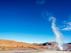 Steam rising out of the ground at the El Tatio Geyser field near San Pedro de Atacama, Chile