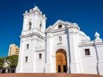 White cathedral of Santa Marta, Colombia with a beautiful deep blue sky; 