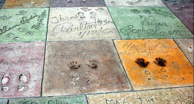 Abstract of Celebrity Hand and Foot Prints Outside of Mann's Chinese Theater in Hollywood, California; Shutterstock ID 320588; Project/Title: City Apps; Downloader: Melanie Marin