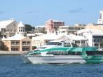 A passenger ferry running along the waterfront in Hamilton, Bermuda; 