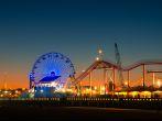 Ferris wheel on Santa Monica Pier lit up at dusk, Santa Monica, Los Angeles County, California, USA.