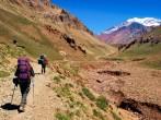 Hikers on their way to Aconcagua as seen in the background, Aconcagua National Park, Argentina, South America.;